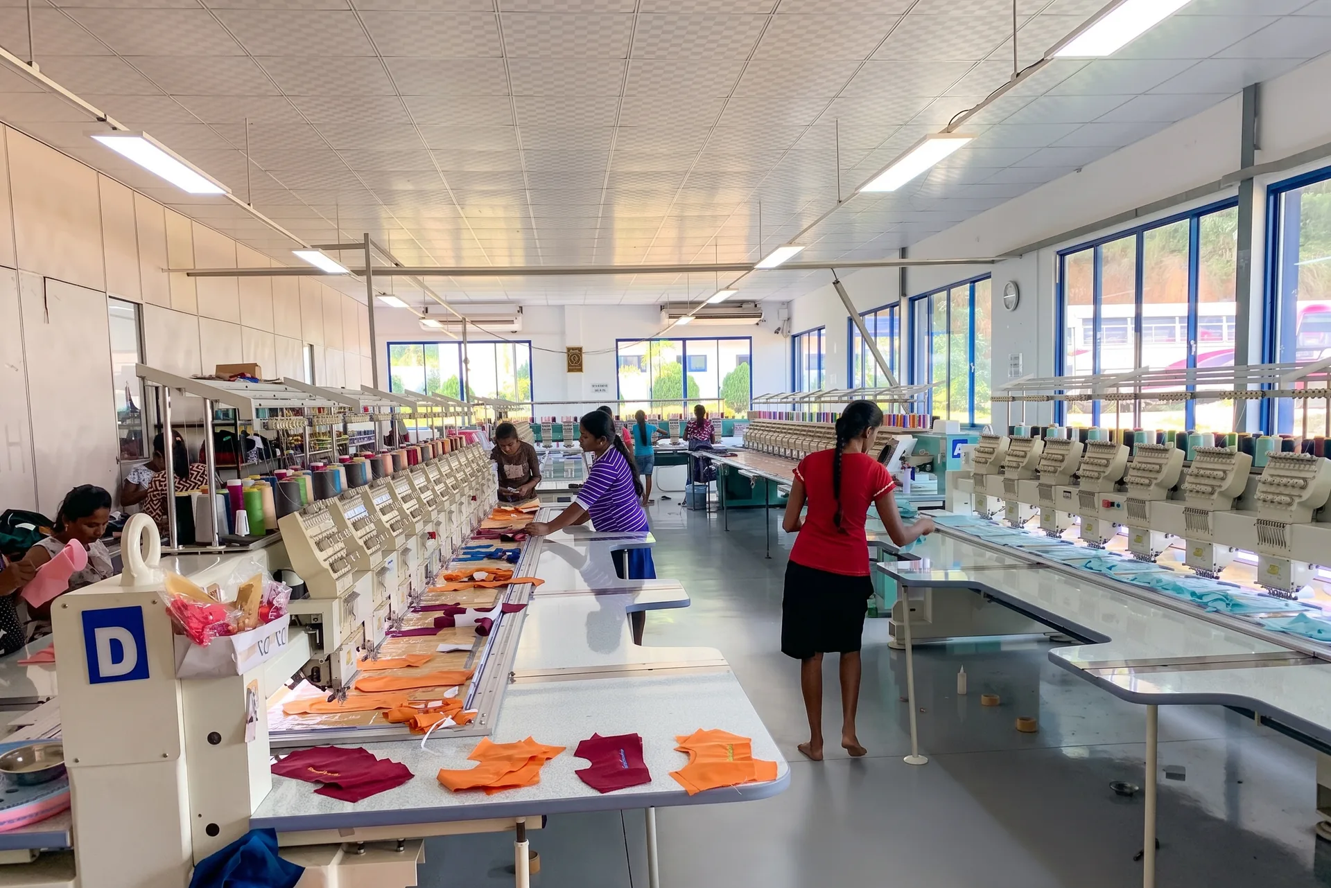 Embroidery section with multiple embroidery machines